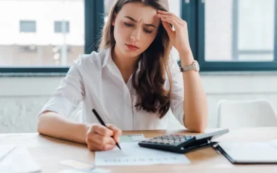 Am I In Too Much Debt? 10 Warning Signs & What To Do Next